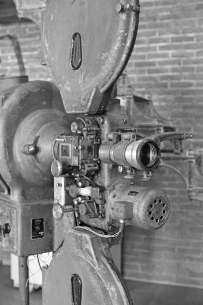 istock antique film projector in black and white style. 697235612