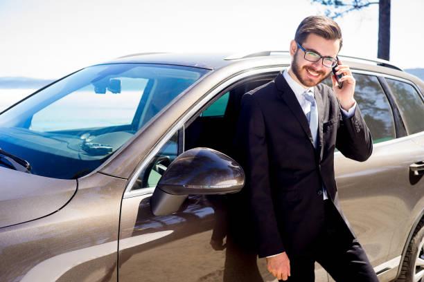 istock Businessman near a car 697235856