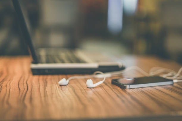 istock Smart phone and headphones 697239930