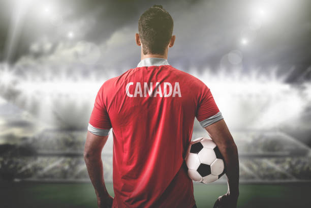 istock Canadian Fan / Sport Player on uniform celebrating 697249500