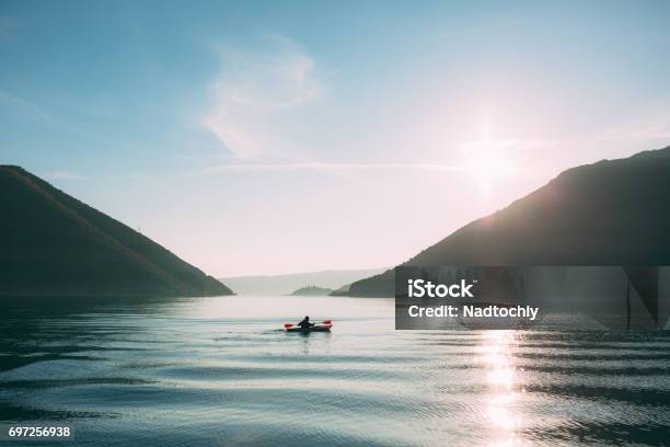 Kayaks In The Lake Tourists Kayaking On The Bay Of Kotor Near Stock Photo - Download Image Now