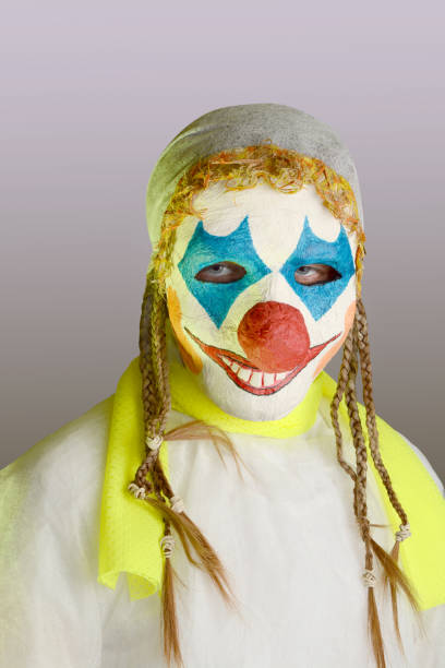 istock Scary clown on a gray background 697257506