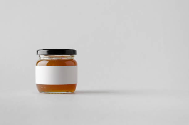 istock Apricot Jam Jar Mock-Up - Blank Label 697264216