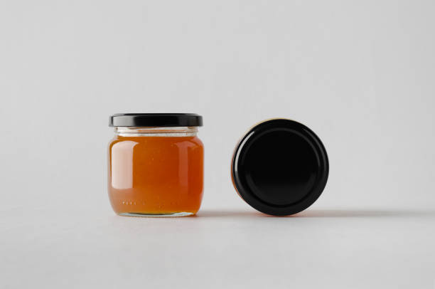 istock Apricot Jam Jar Mock-Up - Two Jars 697267398