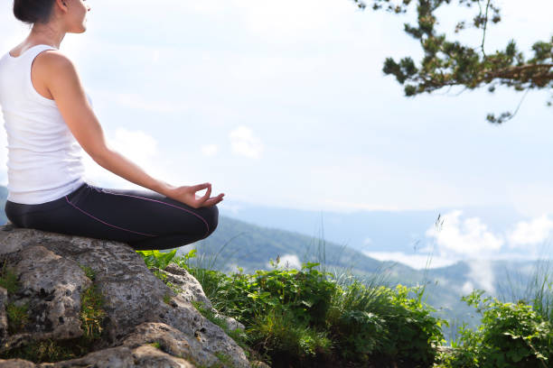 istock Attractive young woman doing a yoga pose for balance 697267730