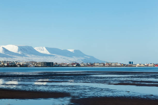 istock Iceland small city with mountain during winter season 697293024