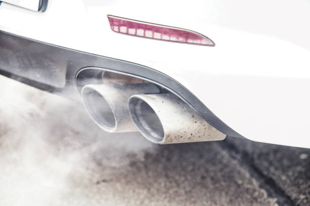 istock close up on pipe exhaust car smoke emission 697293040