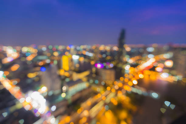 istock Blurred bokeh light city central business downtown aerial view 697293328