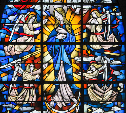 Stained Glass in the Church of Tervuren, Belgium, depicting Mother Mary and the Dogma  of the Immaculate Conception