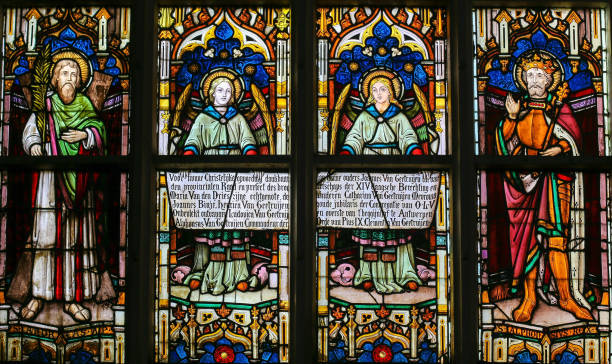 Beautiful Vitrage stained glass windows in St. Vitus Metropolitan Catholic Cathedral in the Prague Castle complex in Prague, Czech Republic on 15 January 2024