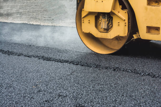 istock Road Roller While Working To crush the asphalt to condense. 697299552