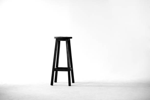 istock Black empty chair symbolizing a free place for a creative person 697299628