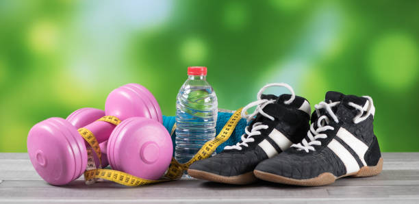 istock Fitness equipment on blurred background 697317014