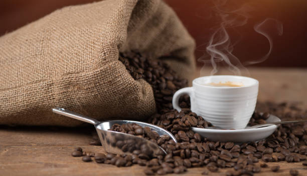 istock Cup of coffee with coffee beans 697317746