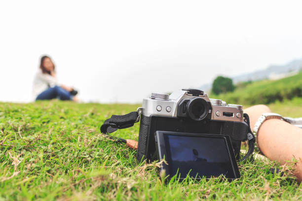 istock closeup vintage camera with soft-focus in the background. over light 697317794