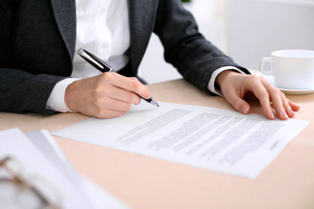 istock Business woman ready to sign a contract 697336506