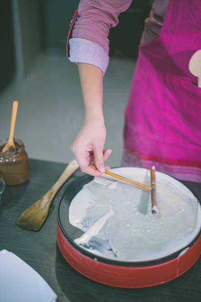 istock Making of home made pancakes. 697354324