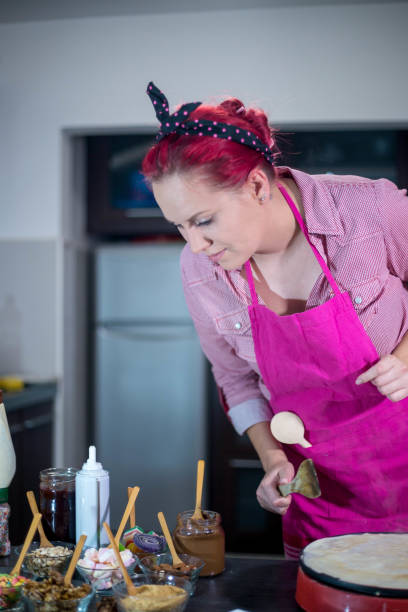 istock Making of home made pancakes. 697354364