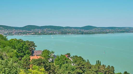 One of Europe's largest lakes - Balaton. Popular tourist tours from many continental countries. Shallow fast warming lake.