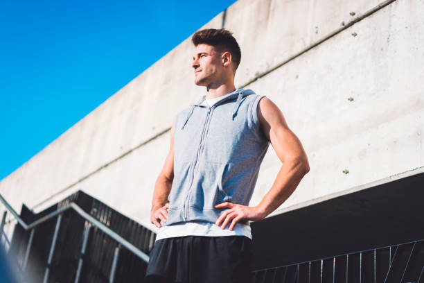 istock Attractive young muscular build male 697371584