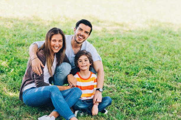 istock Happy family in the park 697375700