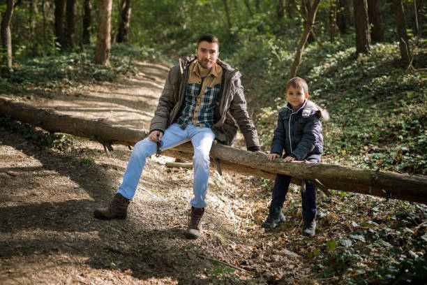 istock Father and Son in Nature 697382582