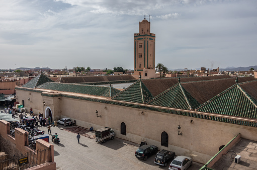 Marrakesh: Roof and minaret of Mosque of Ben Youssef, view from neighbors roof.