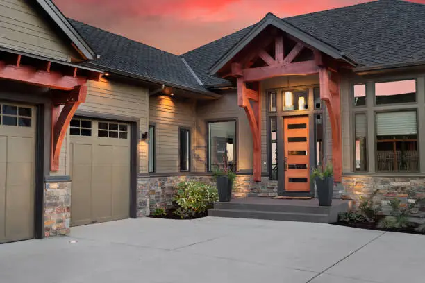 Photo of Beautiful Home Exterior Detail with Colorful Sunset: Front Door,Entrance, and Garage