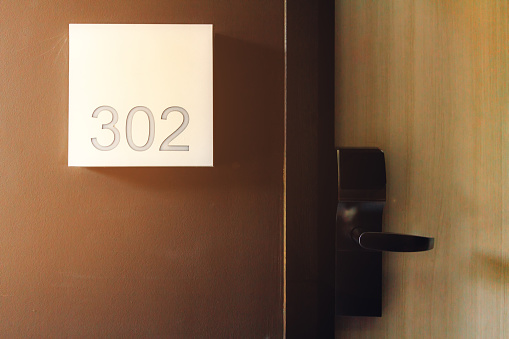 Door with room number in a hotel