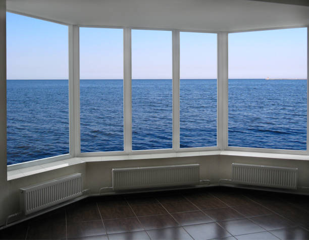 istock plastic window with view of ocean 697420616