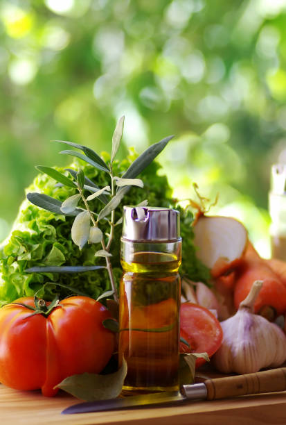 istock fresh vegetables spices, herbs and  oliveoil 697426442