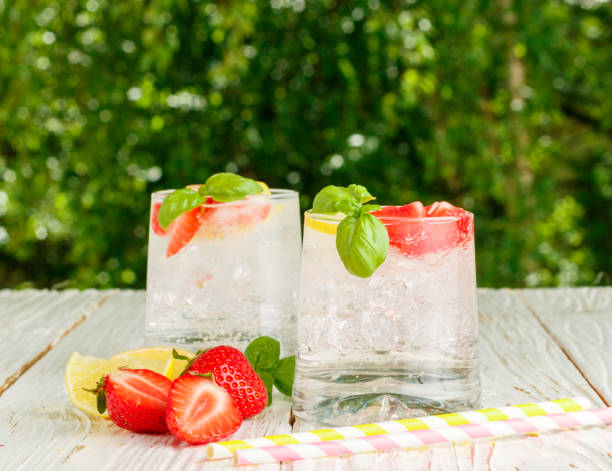 istock Summer a refreshing lemonade. Drink with lemon, strawberries, mint, Basil and ice. Detox. Mineral water. Selective focus 697427616