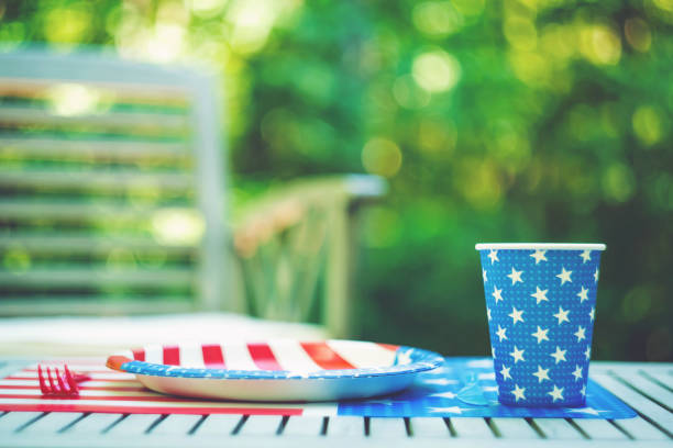 istock Fourth of July party table setting outside 697442566