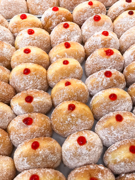 istock Closed up Strawberry jam filled donut 697448922