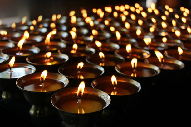 istock Christmas candles burning at night. 697449350