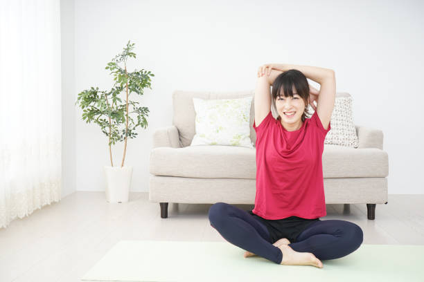 istock Young woman doing some stretches 697451688