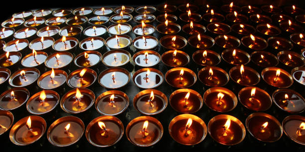 istock Christmas candles burning at night. 697451828