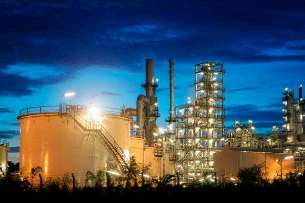 istock Oil and gas refinery industry at blue sky 697462324
