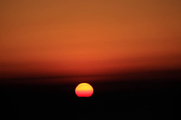 istock Sunrise over mountains at Tigerhill in Darjeeling. 697465540