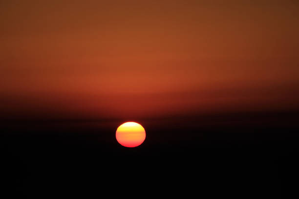 istock Sunrise over mountains at Tigerhill in Darjeeling. 697465550