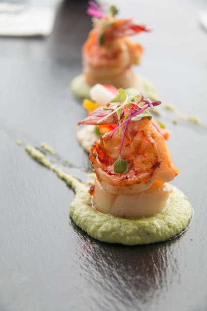 istock Grilled shrimp with sauce and chili. 697465596