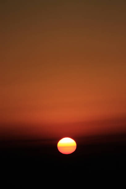 istock Sunrise over mountains at Tigerhill in Darjeeling. 697465610