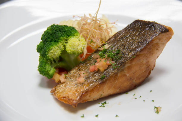 istock Tasty grilled salmon steak on mixedl 697465940