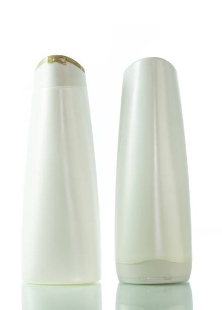 istock Shampoo, gel or lotion white plastic bottle isolated 697472684