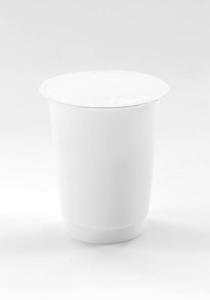 istock blank packaging white plastic cup for yogurt dairy product on white background with clipping path 697478638