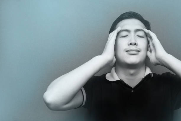istock Portrait of a stressed man  doing massage for relaxing 697485638