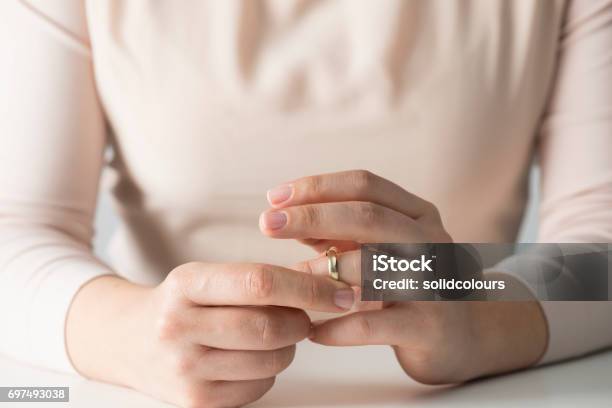 Woman Getting Divorced Stock Photo - Download Image Now - Divorce, Infidelity, Ring - Jewelry