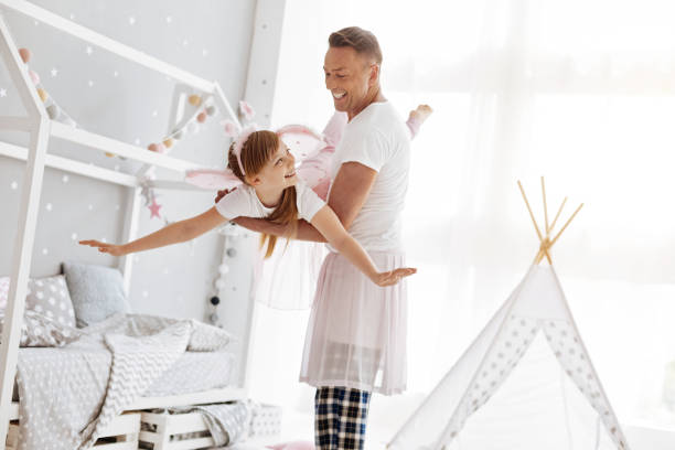 istock Active talented girl feeling like a fairy 697494176