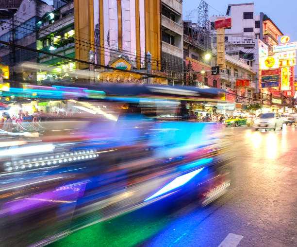 istock bokeh background blurred light in dark night, blur city and traf 697496330