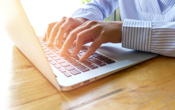 istock Woman office worker is typing keyboard, business technology and education concept 697496510